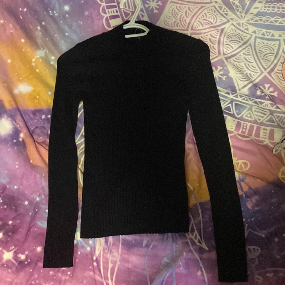 Black Sweater. Ribbed material. Soft and warm. Small neck with zipper in front